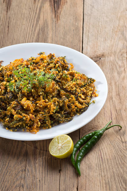 istock Indian Dish: Bitter gourd fry with spices and herbs 1195566416