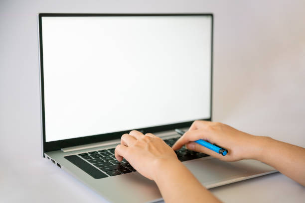 istock Laptop with blank screen on white background 1195566442