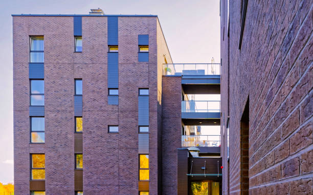 istock Modern architecture of apartment house reflex 1195566989