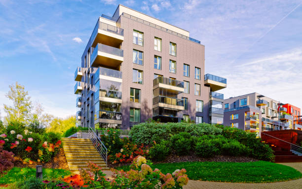 istock Modern glass residential apartment buildings reflex 1195566991