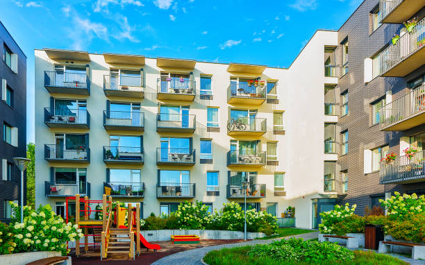 istock Modern residential buildings with flowerpot reflex 1195567627