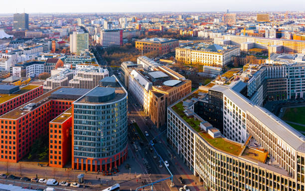 Aerial view and modern apartment residential building architecture Potsdamer Platz reflex Apartment in residential building exterior. Housing structure at blue modern house of Europe. Rental home in city district on summer. Architecture for business property investment in Berlin, Germany. berlin germany urban road panoramic germany stock pictures, royalty-free photos & images