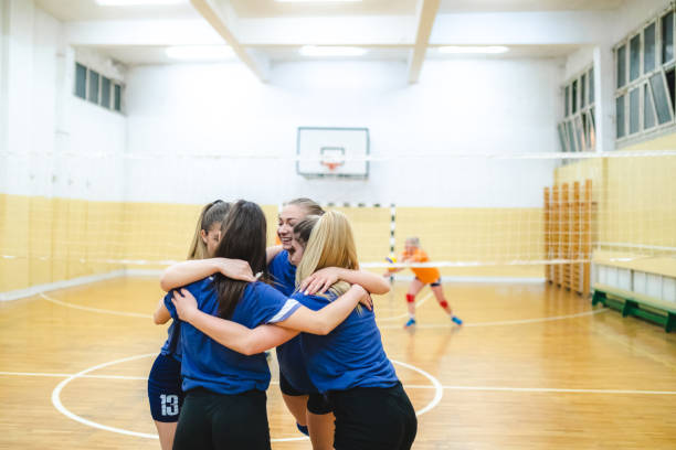 istock Female volleyball celebration 1195568670