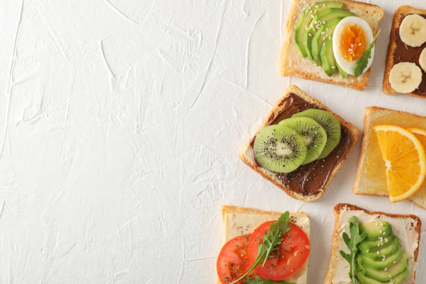 istock Concept with assorted sandwiches on white background, top view 1195568827