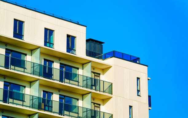 istock Residential apartment house facade and blank copy space reflex 1195571413
