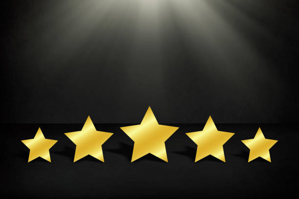 istock The best rating, Five golden star shape on black background 1195572273