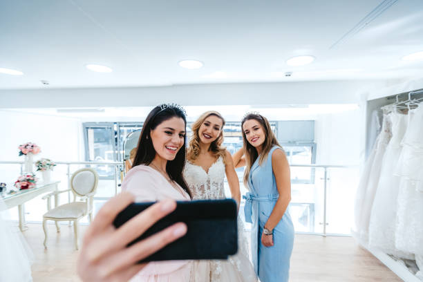 istock Trying wedding dress 1195572735