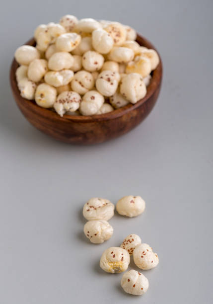 istock Crispy Lotus pops Seeds or Phool Makhana  served in a bowl 1195576720