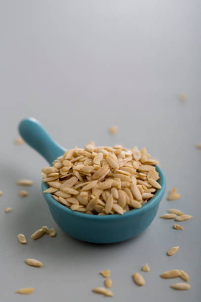 istock Dry Melon seeds in a  small cup 1195579137