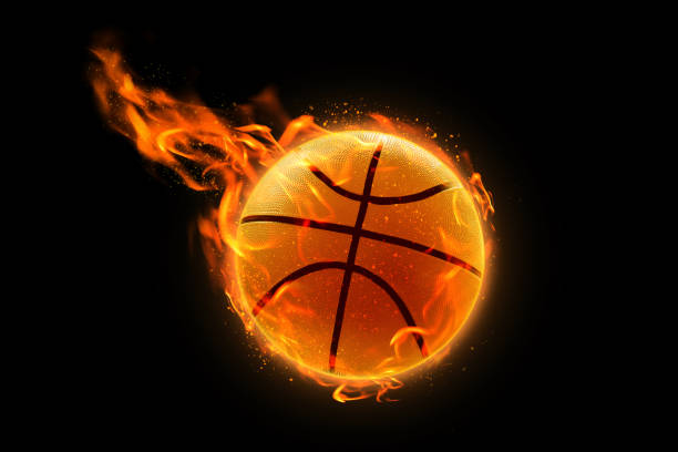 istock Burning basketball on black background 1195579912