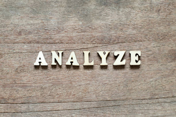 istock Letter block in word analyze on wood background 1195580506