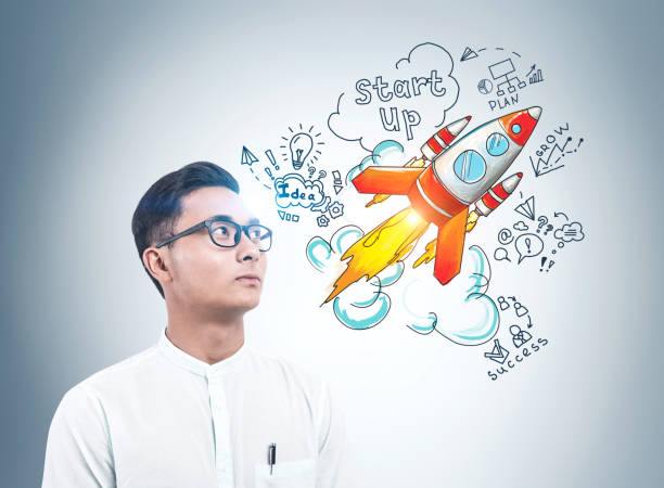 istock Asian businessman and startup sketch 1195584572