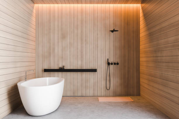 istock Wooden bathroom interior, shower and tub 1195584608