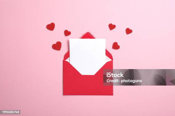 Red Paper Envelope With Blank White Note Mockup Inside And Valentines Hearts On Pink Background Flat Lay Top View Romantic Love Letter For Valentines Day Concept Stock Photo - Download Image Now