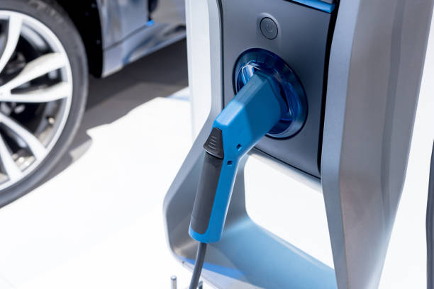 Charging an electric car with chargepoint. Electric vehicle (EV). eco-friendly Lifestyle. stock photo