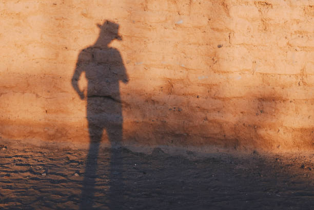 Playing with shadows, Cowboy silhouette on the wall