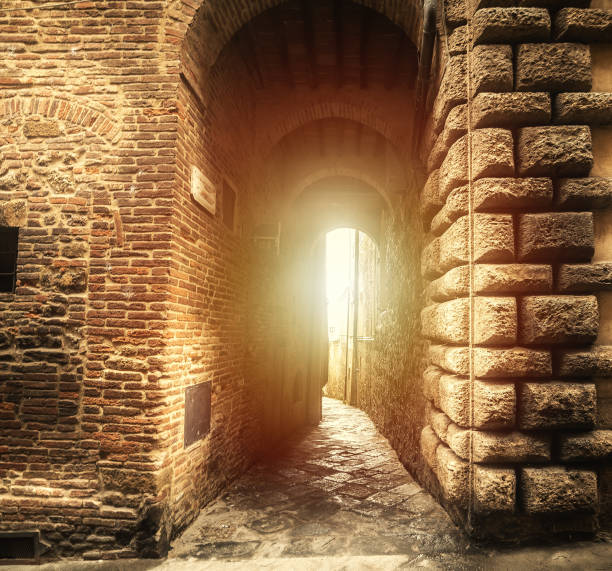 istock Old arches in Montepulciano 1195595019