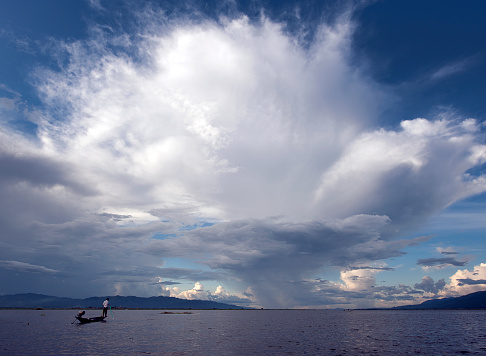 Inle Lake Life, Shan State, Myanmar. The picturesque fresh water Inle Lake with its tranquil waters, tributaries, inlets and floating agricultural gardens is the second largest  and highest altitude lake in Myanmar, with a rich wealthy hive of activity, cottage industry,  handicrafts and subsistence farming that makes it one of the most productive places for its ethnic group of Inntha, or Inn Tha self-sufficient farmers