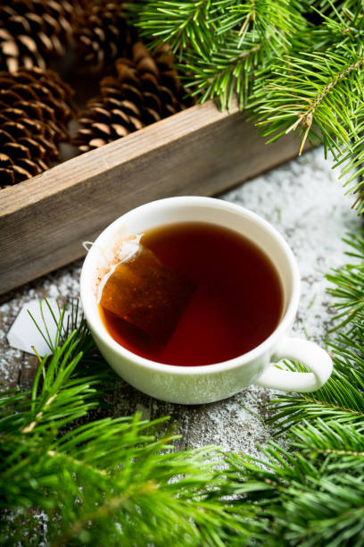 istock Cup of tea with forest decorations 1195602703