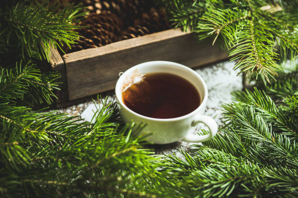 istock Cup of tea with forest decorations 1195602704