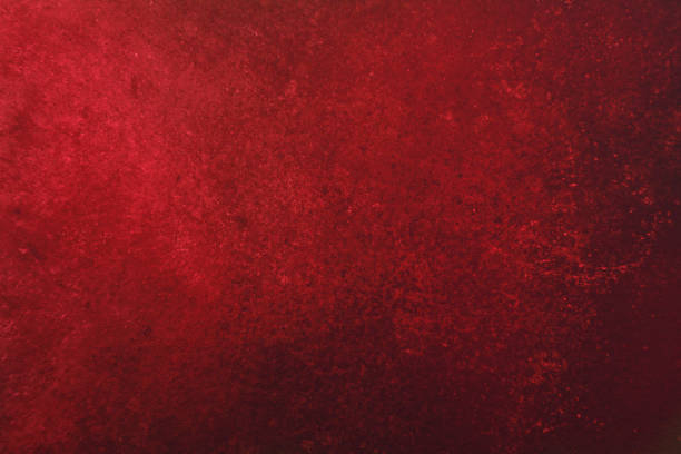 istock bright red dark spots industrial background 1195602823