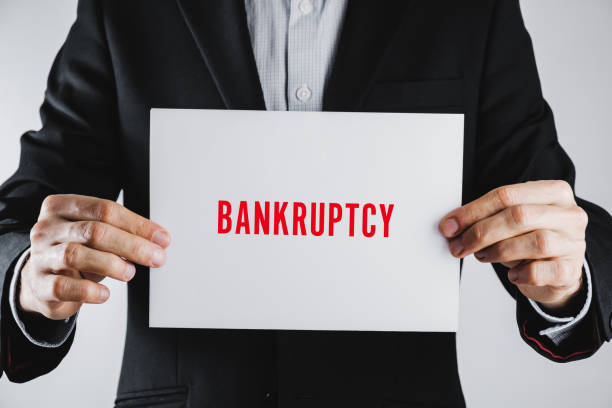 istock Going bankcrupt, having financial difficulties in business sign. 1195603013