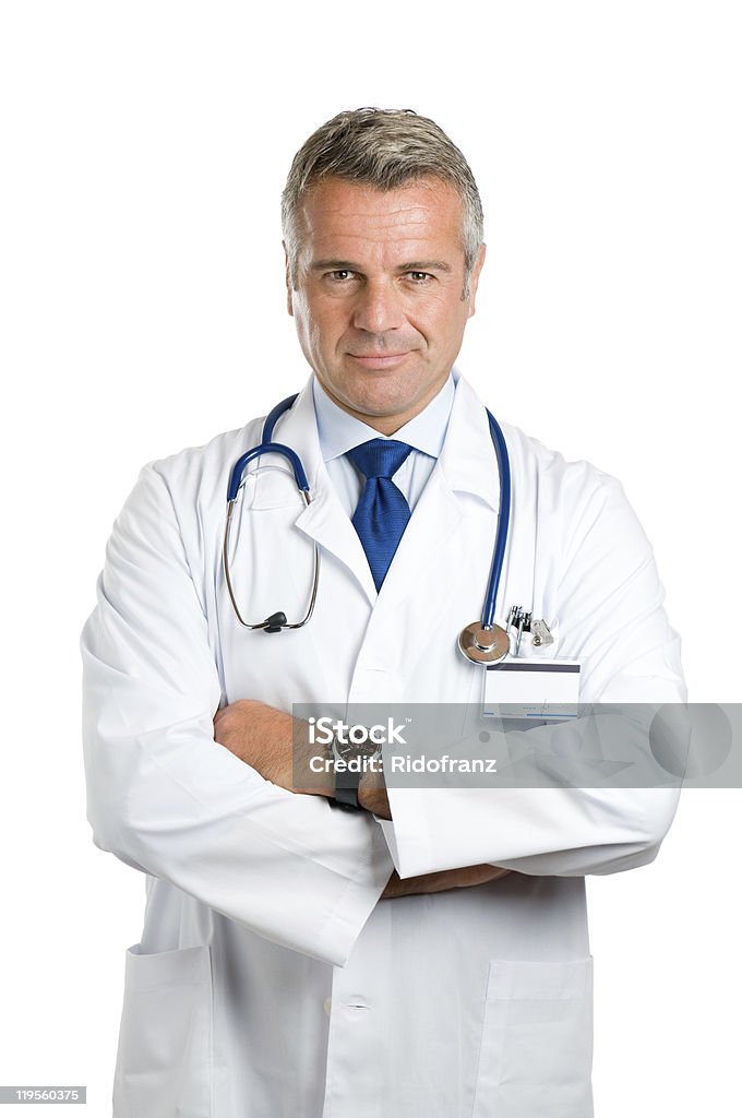 Portrait of senior male doctor with stethoscope and lab coat Portrait of smiling mature doctor isolated on white background.  Doctor Stock Photo