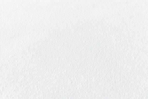 istock White snow background with fine texture. 1195603999