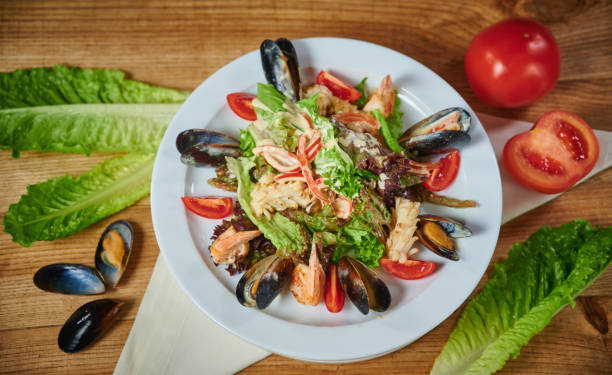 istock Salad with shrimp and mussels 1195606380