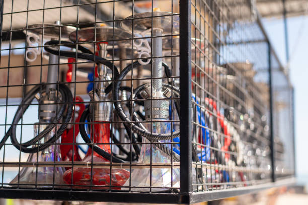 istock Many Hookah standing storage in metall cage 1195612952