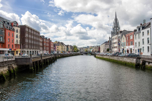River Lee in Cork City. Ireland city center with various shops, bars and restaurants River Lee in Cork City. Ireland city center with various shops, bars and restaurants county cork stock pictures, royalty-free photos & images