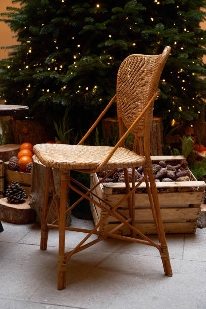 istock Christmas tree with festive table with mandarins, oranges and pine tree cone 1195615223