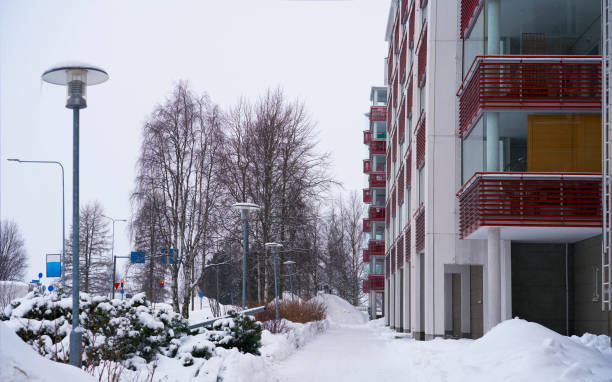 Apartment in residential building exterior. Housing structure at blue modern house of Europe. Rental home in city district on summer. Wall and glass high architecture for business property investment.