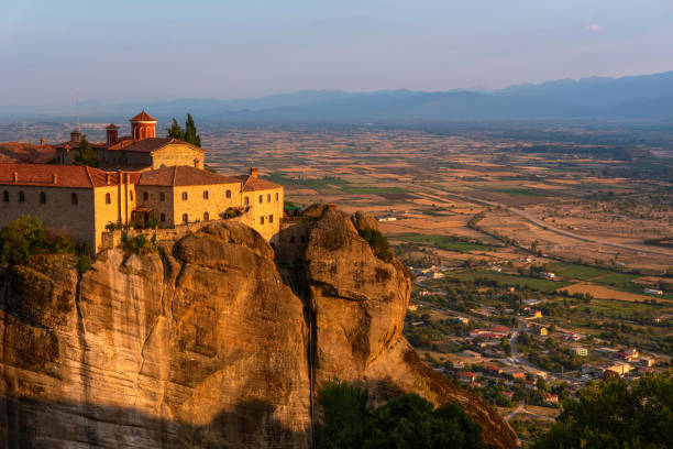 istock Monastery on a mountain and a city in Greece close up 1195617784