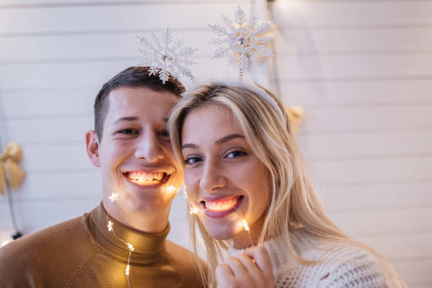 istock Cheerful couple having fun during new year's eve 1195621995