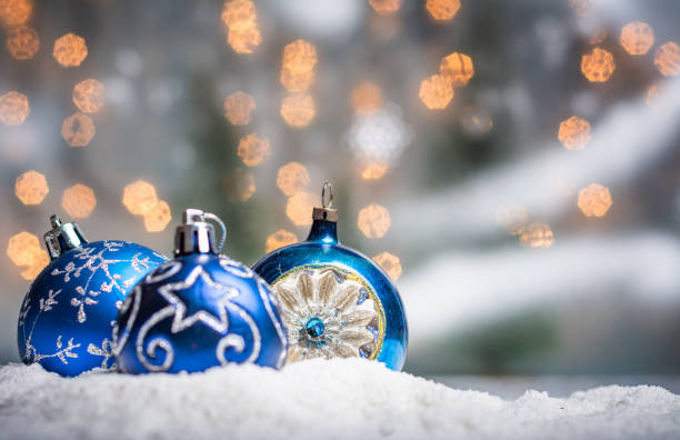 Festive Christmas ornaments with shiny background and copy space