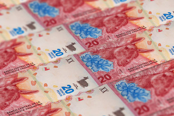 istock Closeup Argentine pesos banknotes background. ARS pattern. 20 peso 1195626141