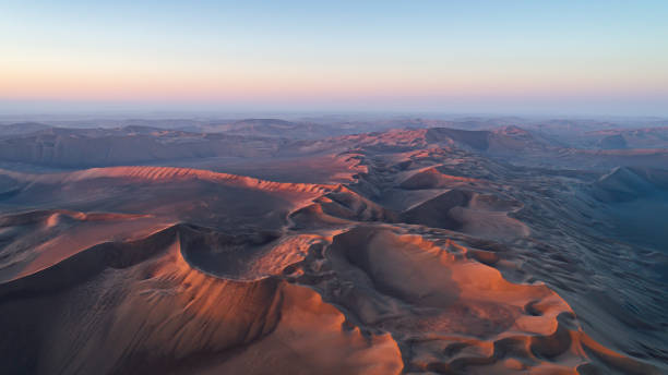 istock cloudy late sunrise in the Lut desert 1195628931