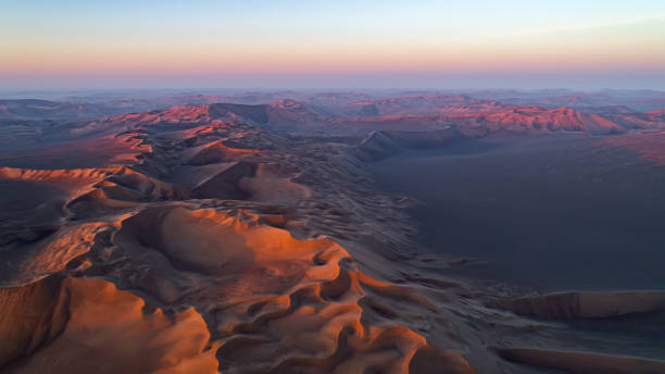 istock cloudy late sunrise in the Lut desert 1195628950