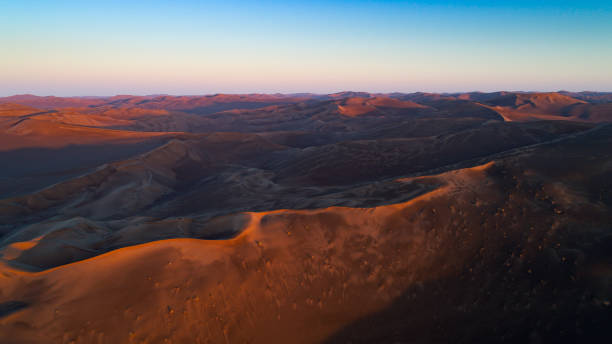 istock cloudy late sunrise in the Lut desert 1195629175