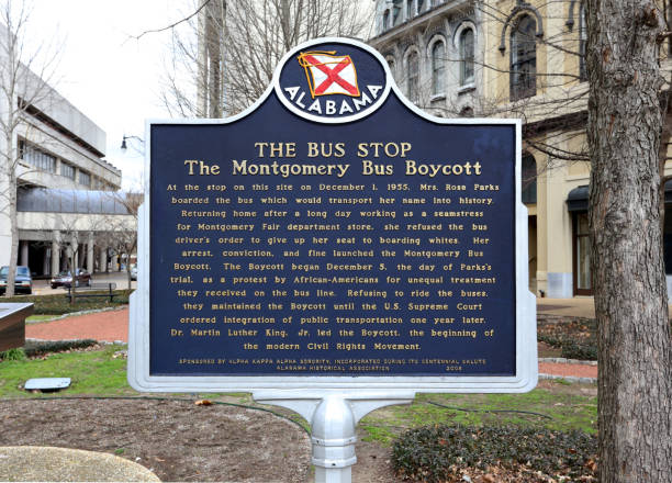 The Rosa Parks Bus Stop Montgomery, Alabama, USA - February 4, 2019: A sign marking the location of Rosa Parks' bus stop in Montgomery, Alabama. Rosa Parks is a well-known activist in the American civil rights movement. segregation stock pictures, royalty-free photos & images