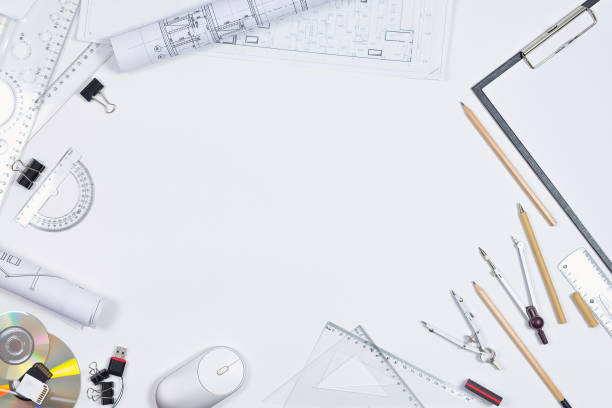 istock Architectural plans, pencil and ruler on the table. Place for your text 1195637903