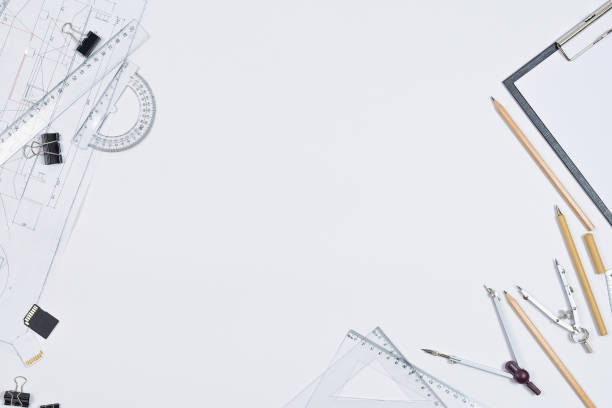istock Architectural plans, pencil and ruler on the table. Place for your text 1195637915