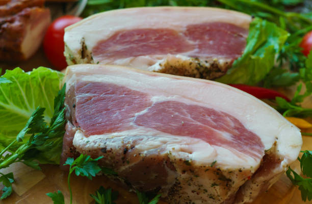 istock Pork pieces are salted in the traditional way. 1195640030