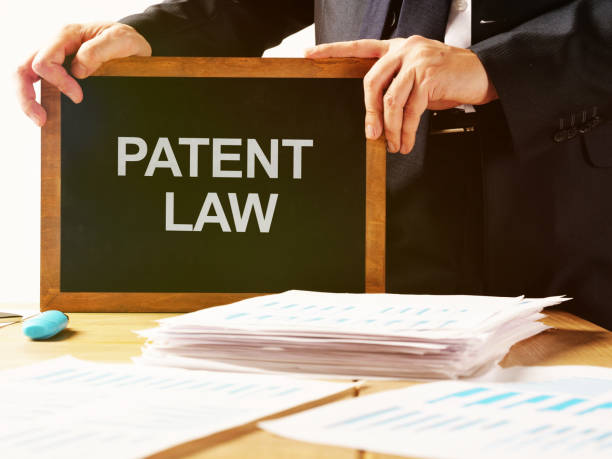 istock Conceptual photo showing printed text patent law 1195642958