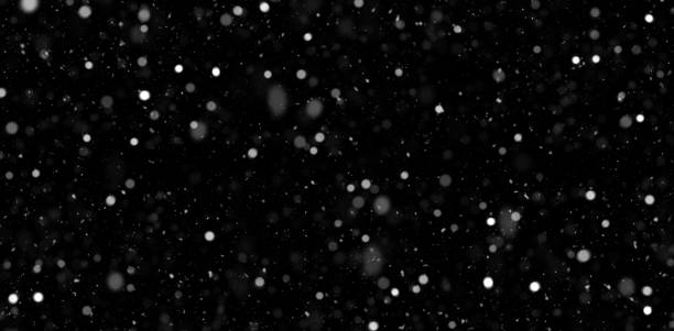 istock Falling snow on black background. Magic snowfall in pure dark. 1195647150