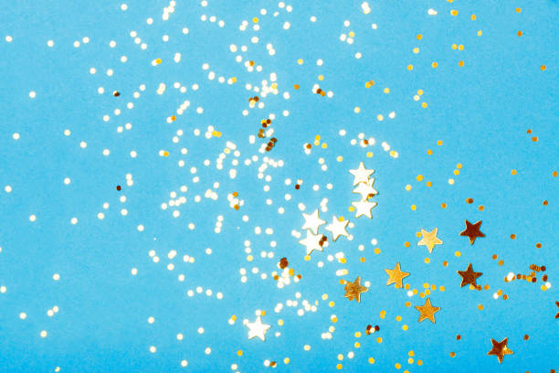 istock Trendy blue background with golden stars 1195648284