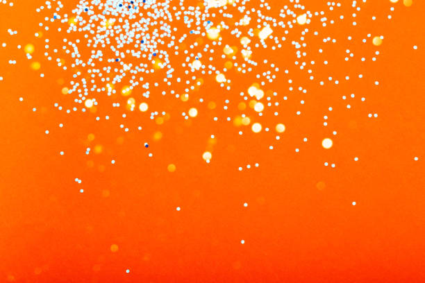 istock Festive trendy orange and blue background with sparkles 1195648290