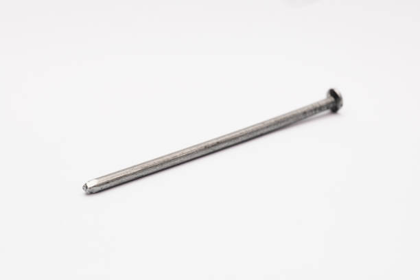 istock Metal Nail on White Background 1195652591