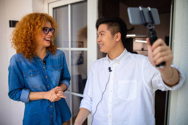 istock Young pretty woman laughing during an interview 1195654360